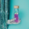 Bouteille sensorielle Move - Magique