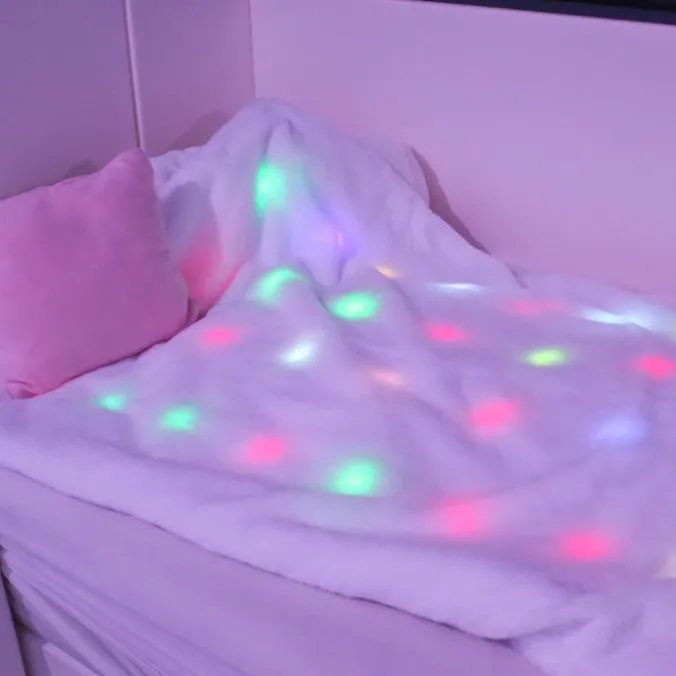 Couverture sensorielle lumineuse